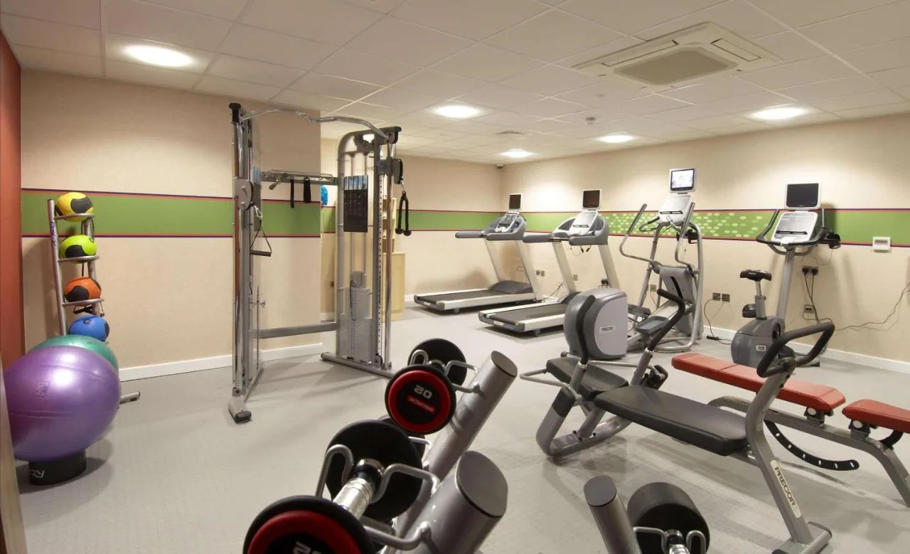 gym with treadmills and cardio machines at Hampton by Hilton Birmingham Broad Street
