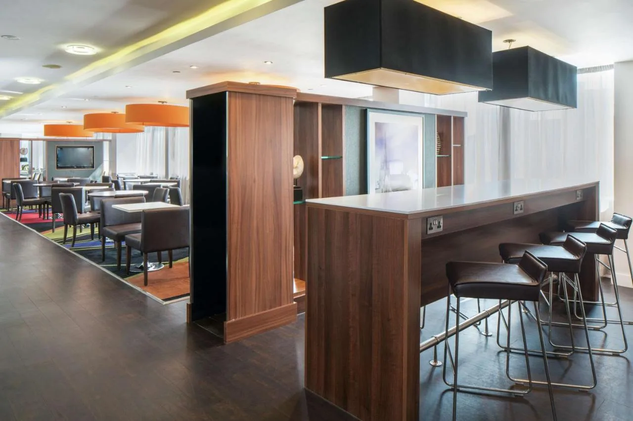 hotel bar area with seating at Hampton by Hilton Birmingham Broad Street